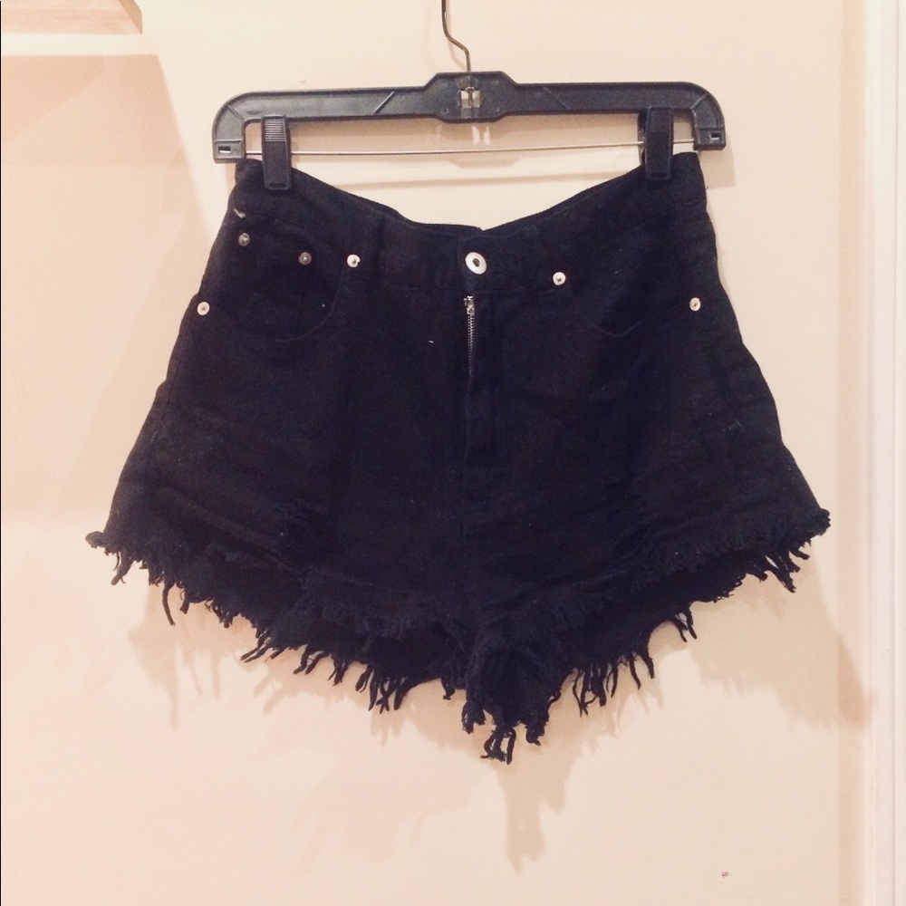Frayed black cutoff denim shorts